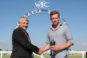  Matt Laure being presented the winning trainer's cup for Tigerland